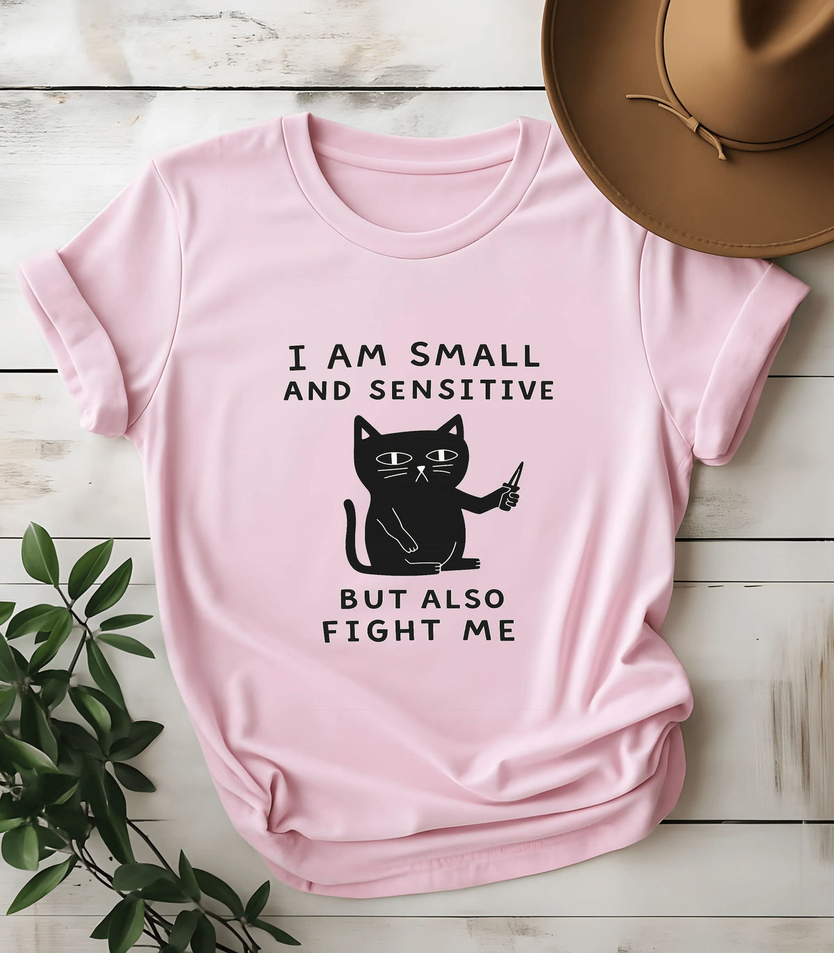 Funny cat graphic tee with bold text on pink t-shirt