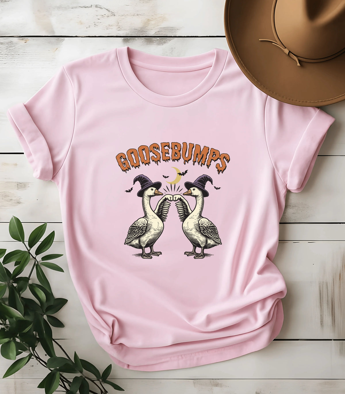 Goosebumps witch geese graphic tee on pink shirt