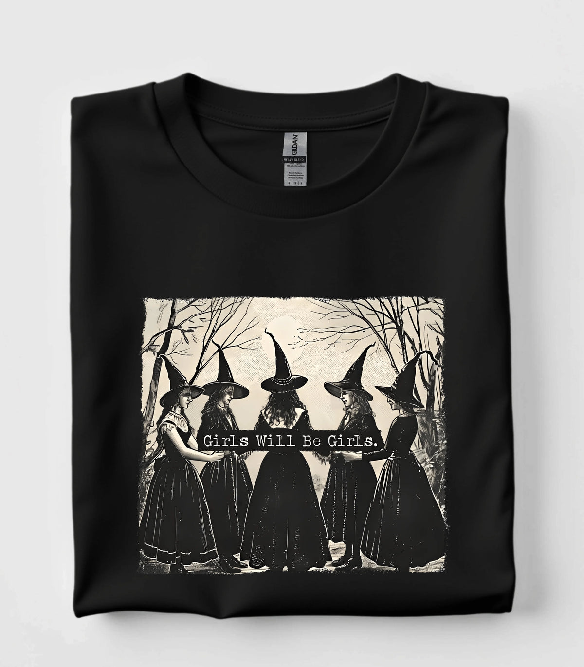 Funny witch graphic t-shirt with 'Girls Will Be Girls' text on black tee