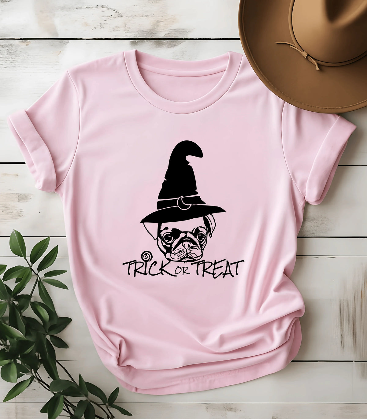 Pink t-shirt with pug in witch hat and 'Trick or Treat' text