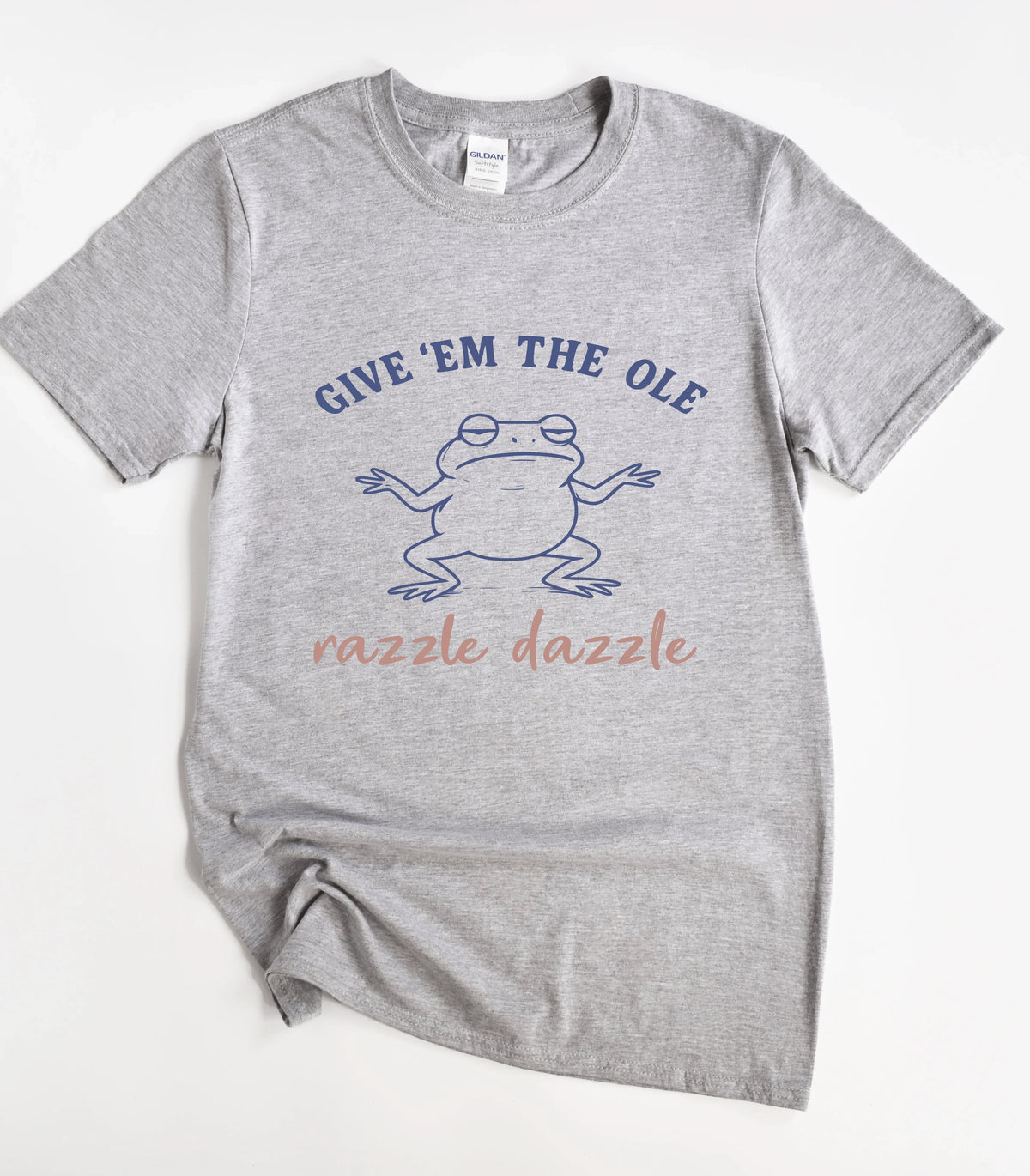 Funny frog graphic tee with 'Give 'Em the Ole Razzle Dazzle' text