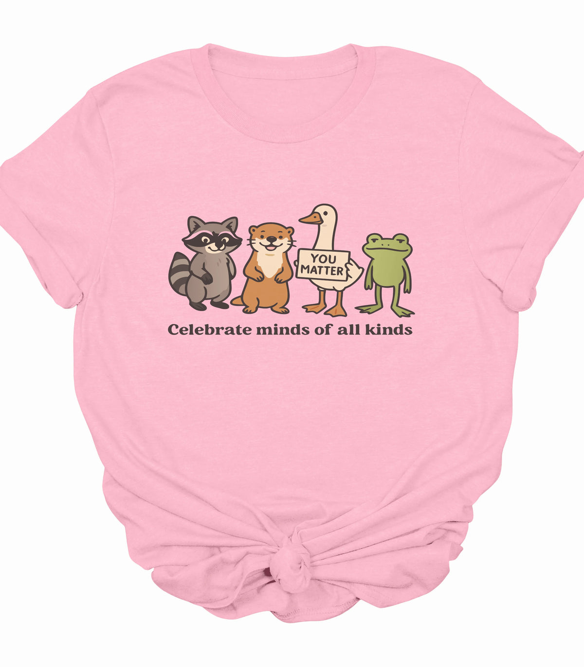 Pink graphic t-shirt with raccoon, otter, goose, frog and 'Celebrate minds of all kinds' text