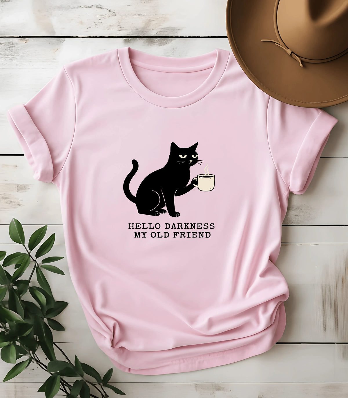 Funny cat graphic tee with 'Hello Darkness My Old Friend' text on pink shirt