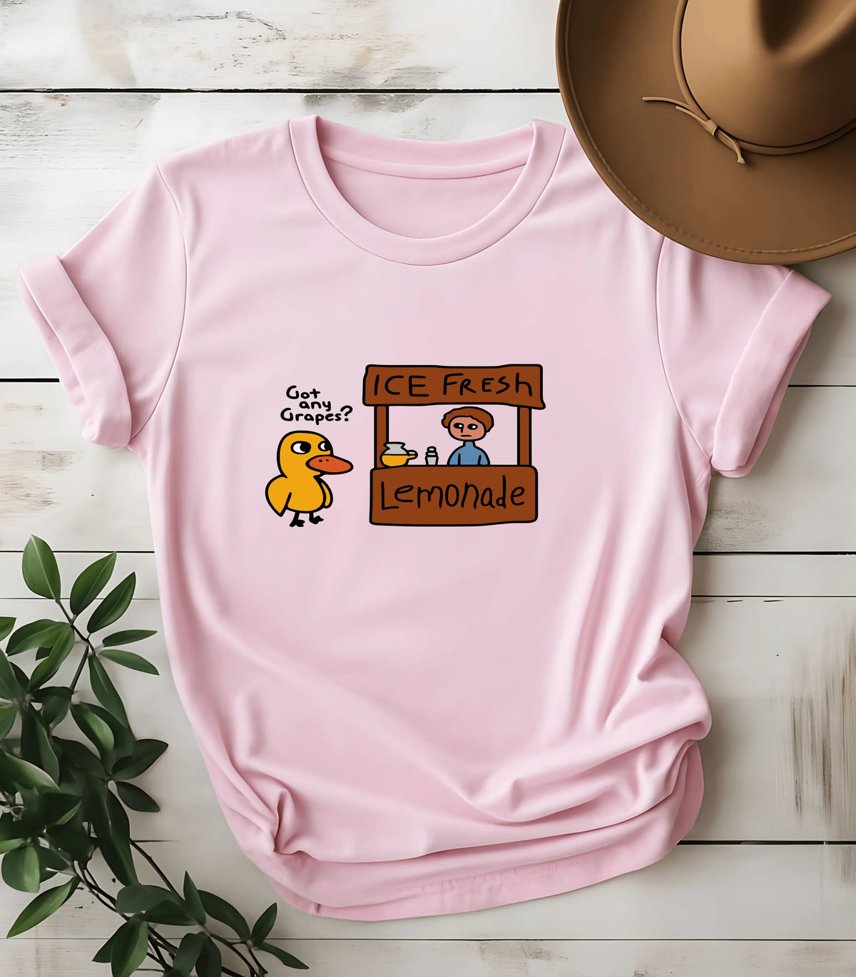 Pink t-shirt with funny duck asking 'Got any Grapes?' at lemonade stand graphic