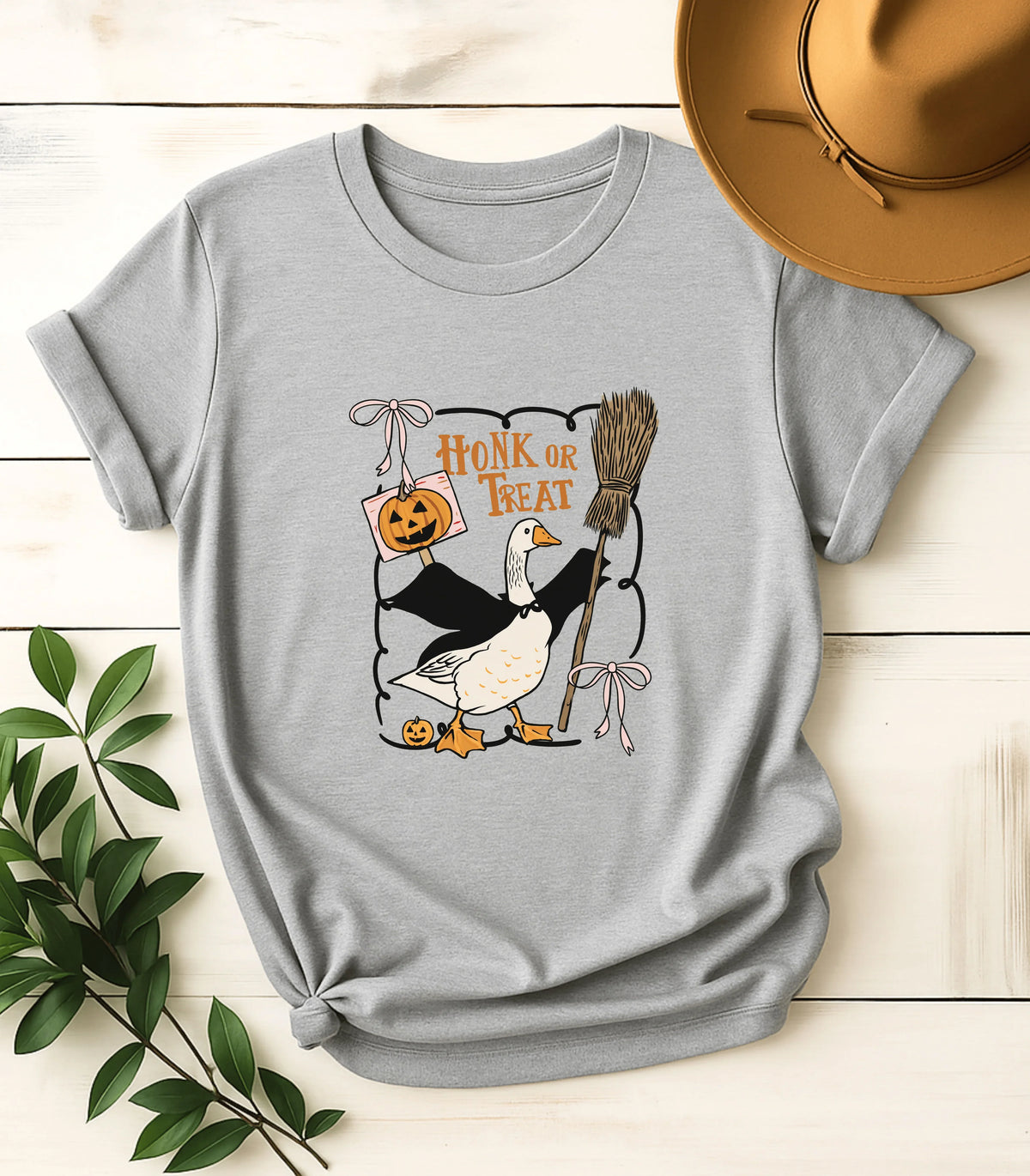 Funny Halloween goose graphic t-shirt with 'Honk or Treat' design
