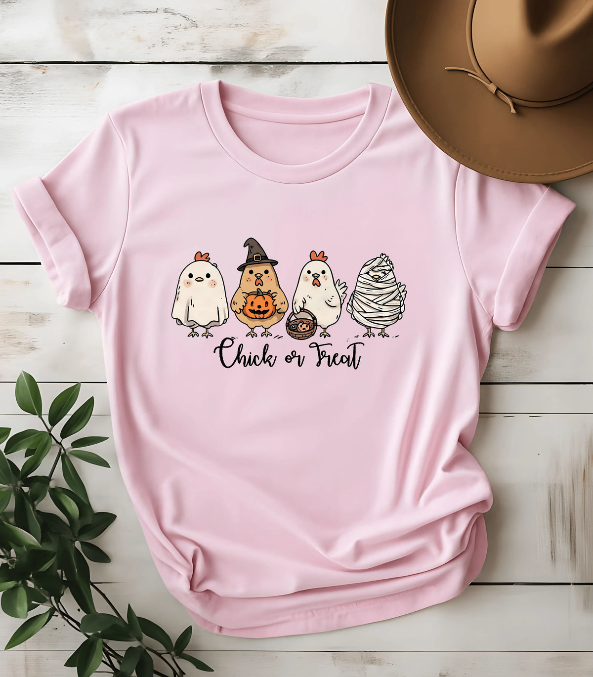 Pink t-shirt with cute Halloween chicken graphic and 'Chick or Treat' text