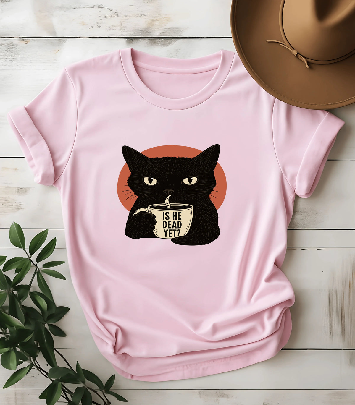 Funny cat graphic tee with black cat holding coffee cup saying 'Is He Dead Yet?'