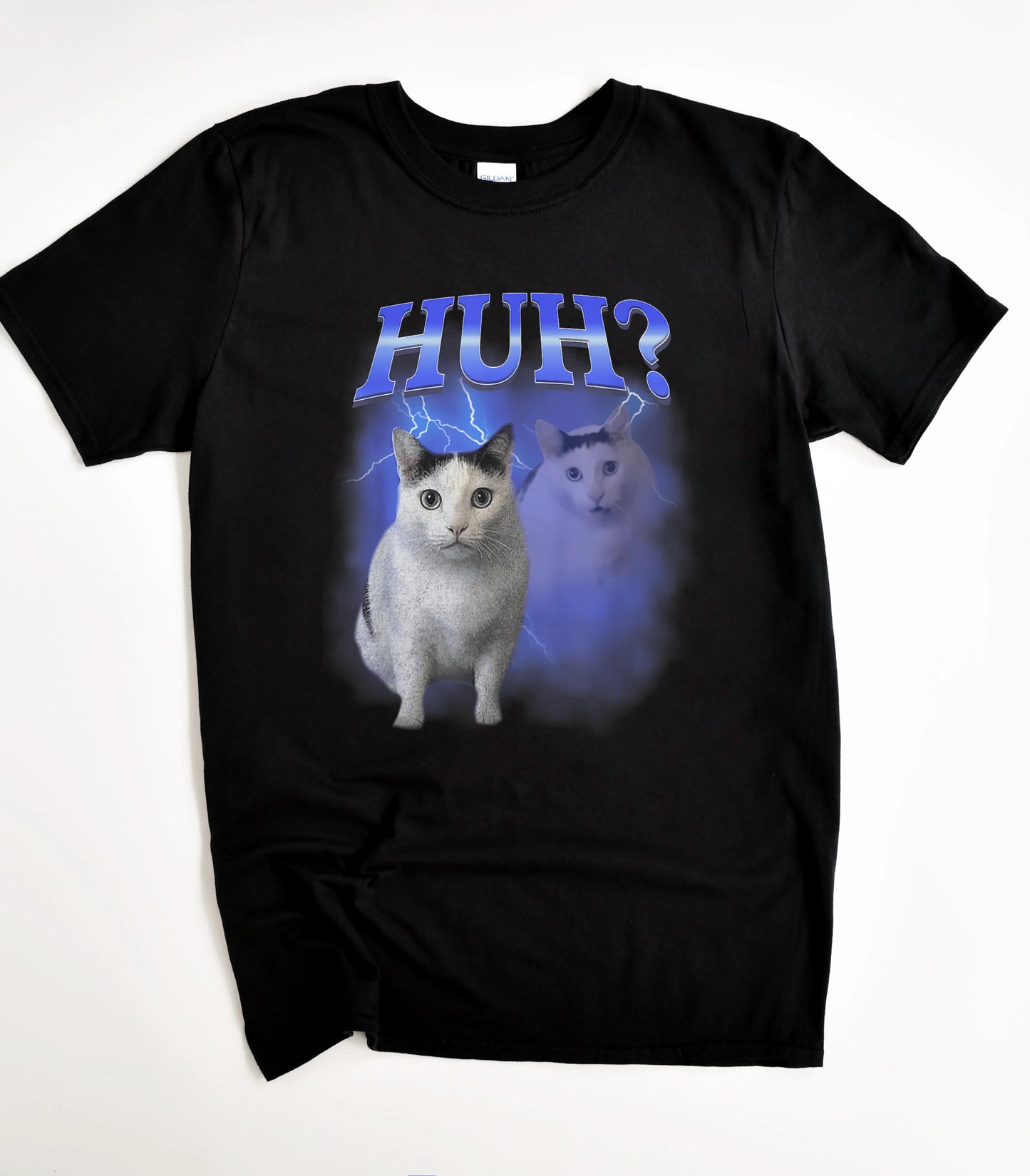 Funny cat graphic tee with 'HUH?' text and lightning design on black shirt