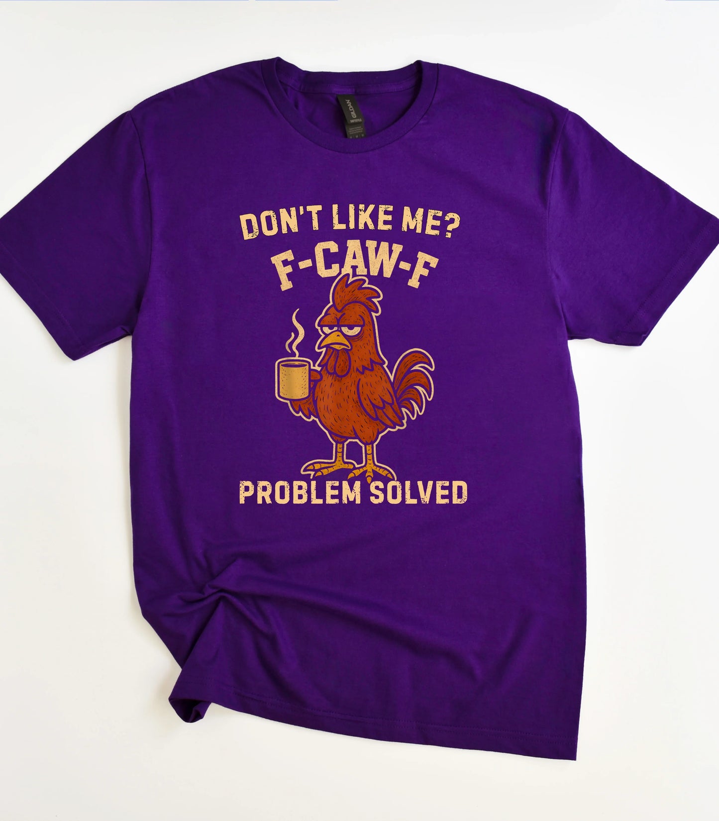 Funny chicken graphic tee with bold text on purple shirt