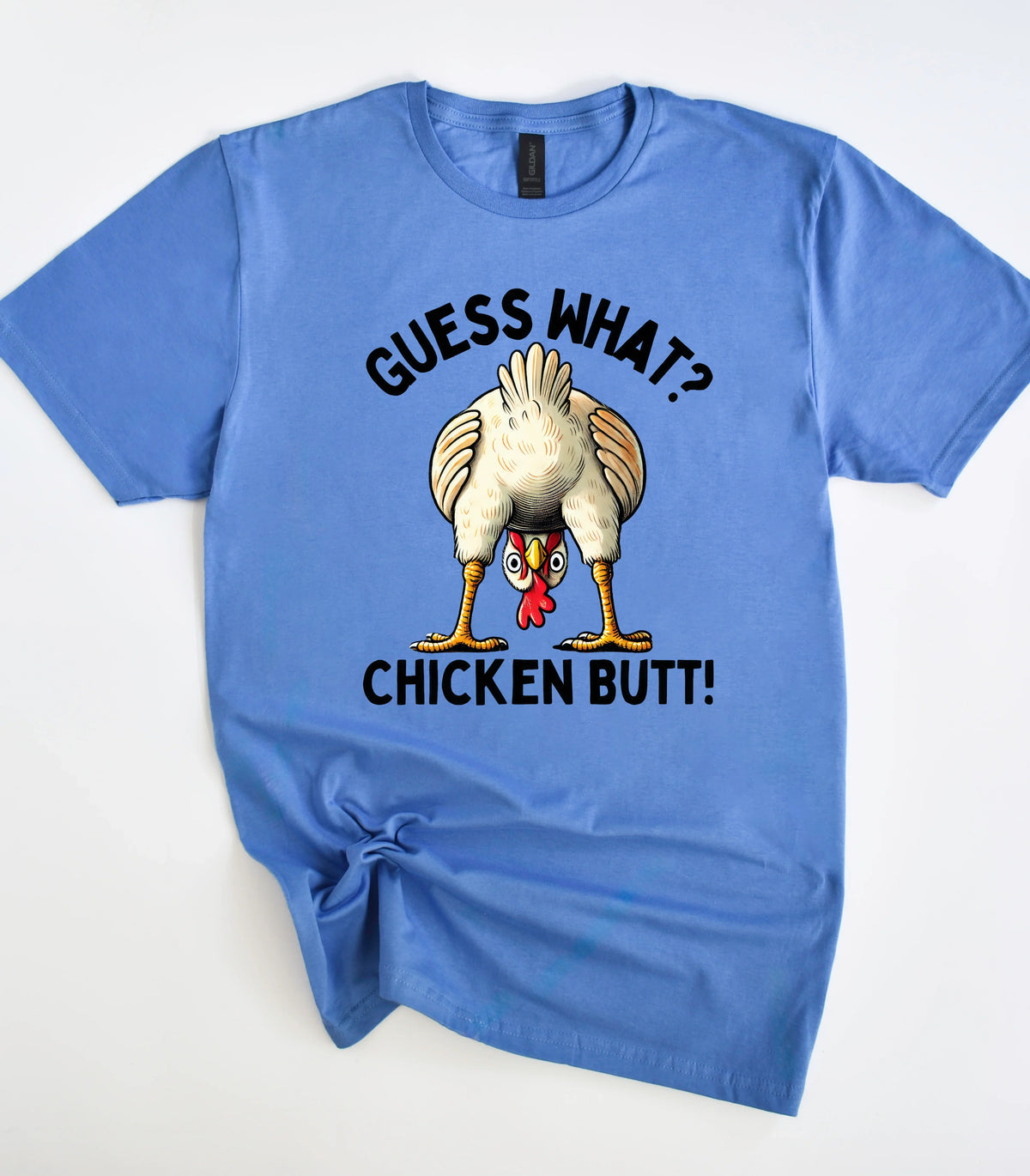Funny chicken graphic t-shirt with 'Guess What? Chicken Butt!' text on blue tee
