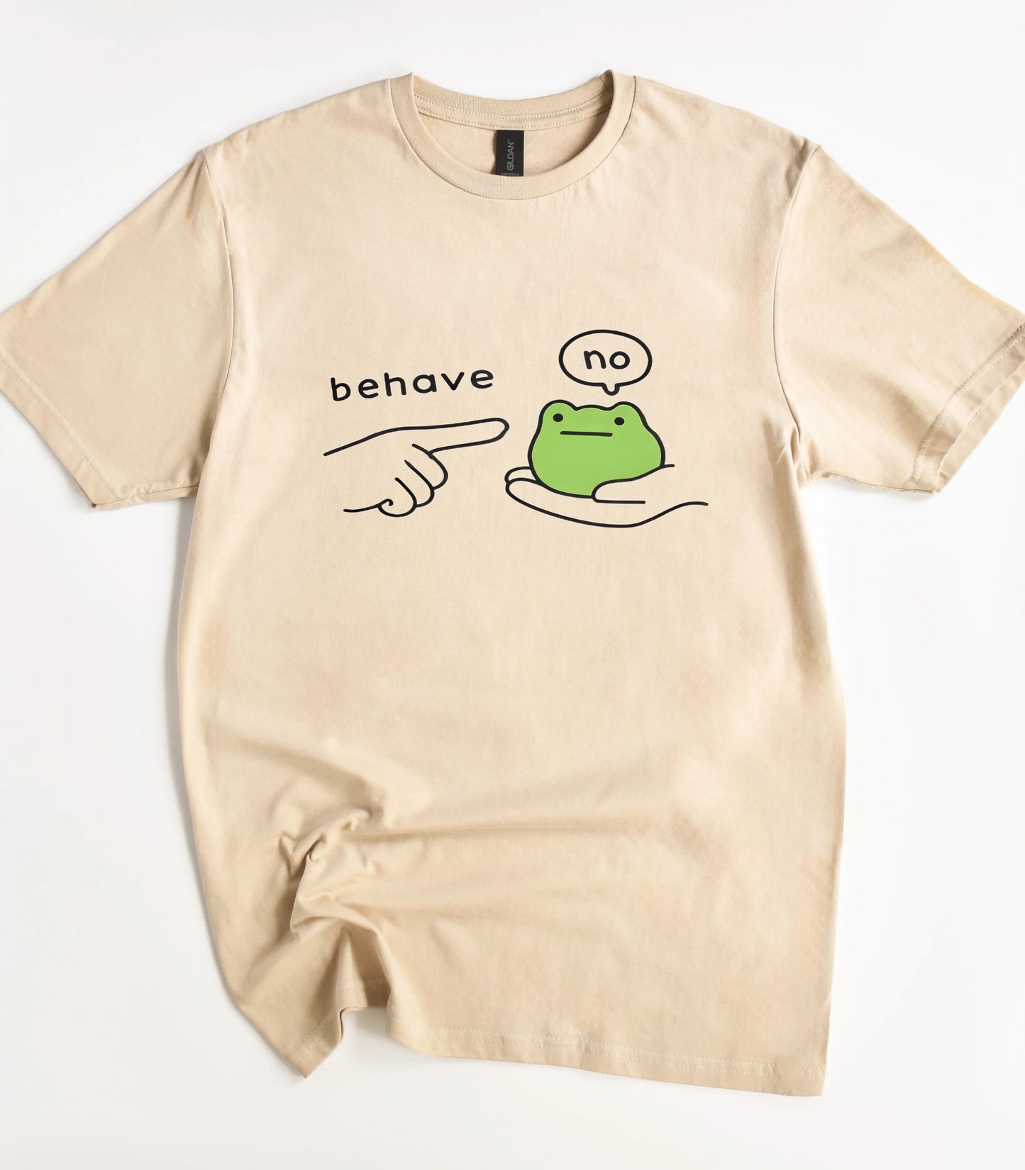 Funny frog graphic tee with 'behave' text and 'no' speech bubble