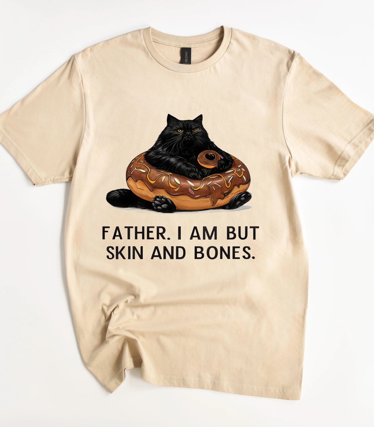 Funny cat graphic tee with black cat on donut and text 'FATHER. I AM BUT SKIN AND BONES.'