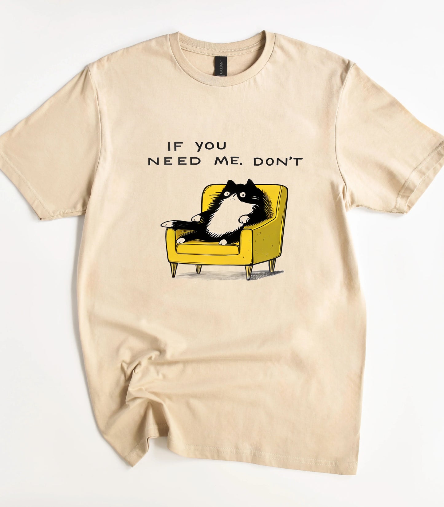 Funny cat graphic tee with cat in yellow chair and text 'IF YOU NEED ME. DON'T'