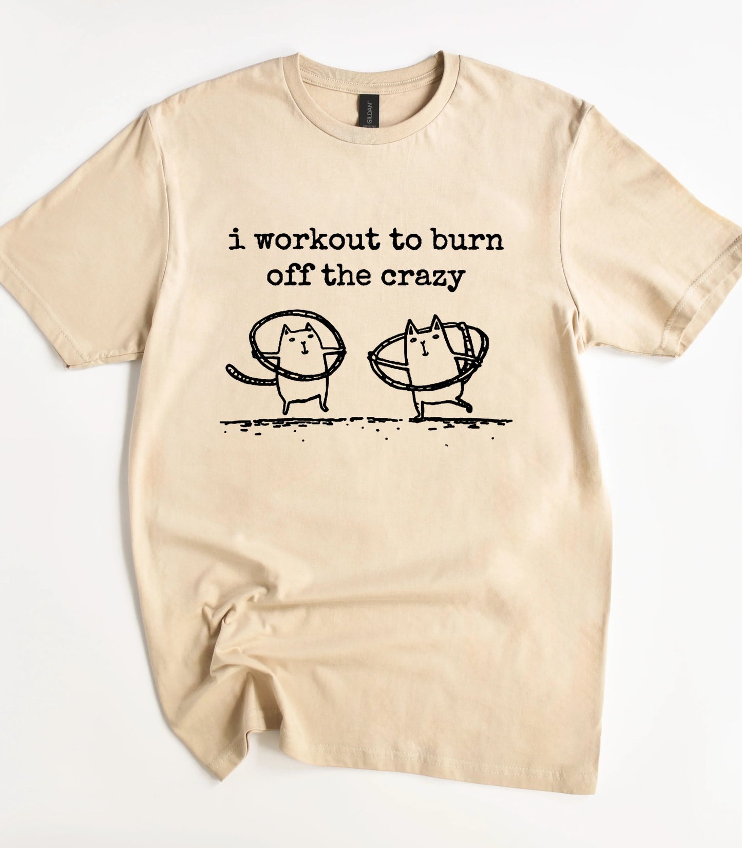 Funny cat graphic tee with 'i workout to burn off the crazy' text