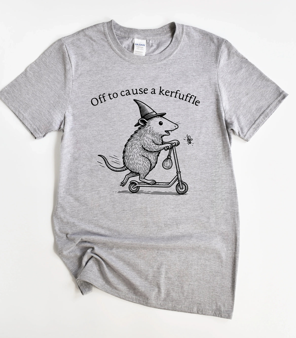 Funny rat graphic tee with witch hat on scooter