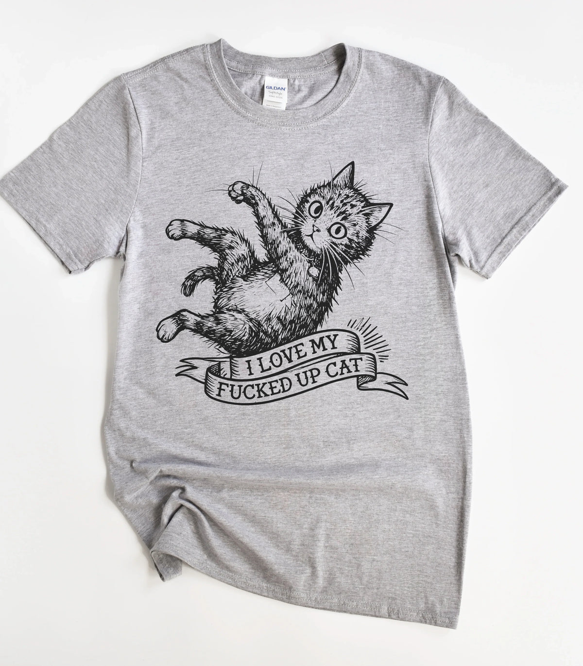Funny cat graphic tee with 'I Love My Fucked Up Cat' text on gray shirt
