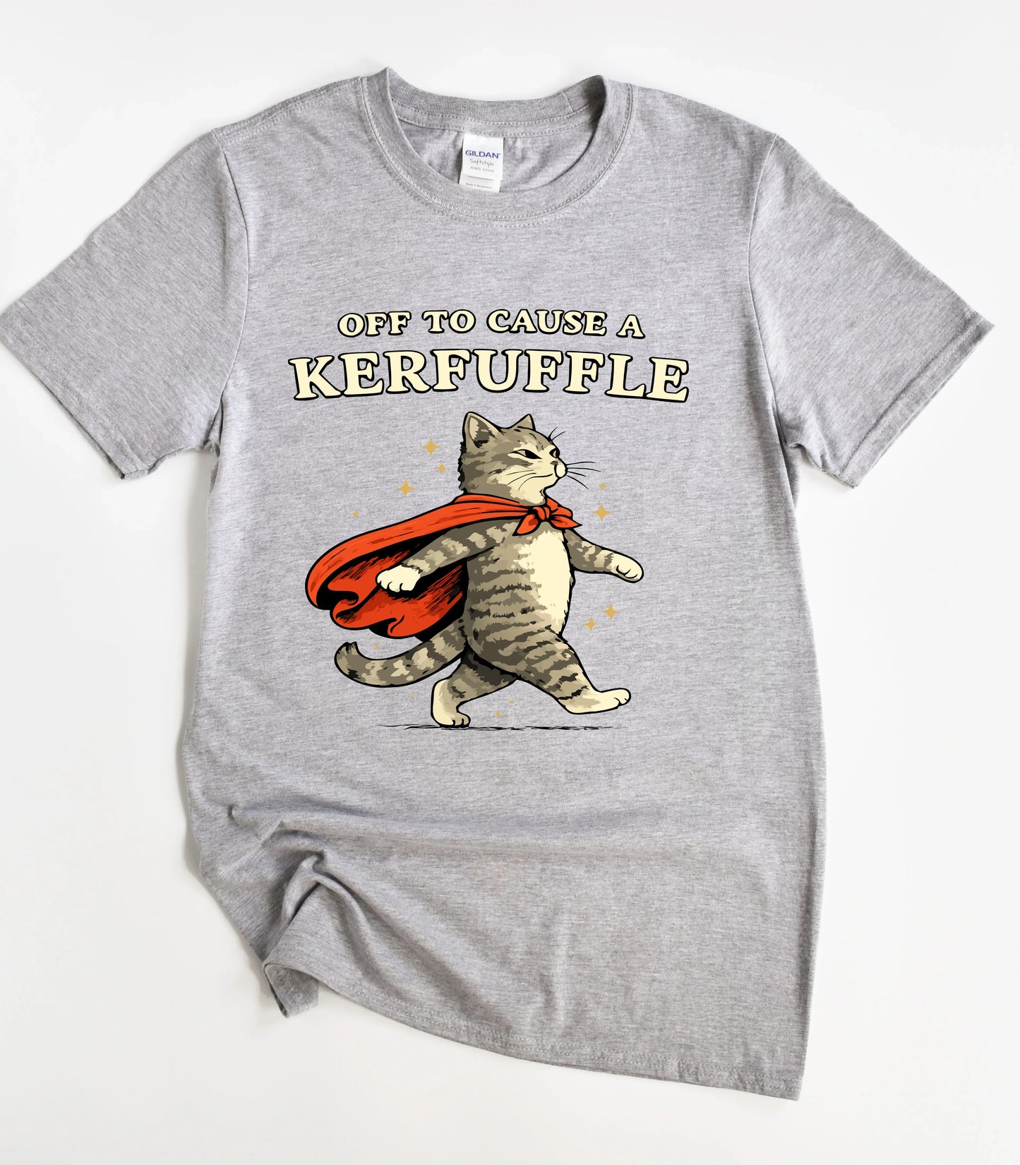 Funny cat graphic tee with superhero cat and 'Off to Cause a Kerfuffle' text