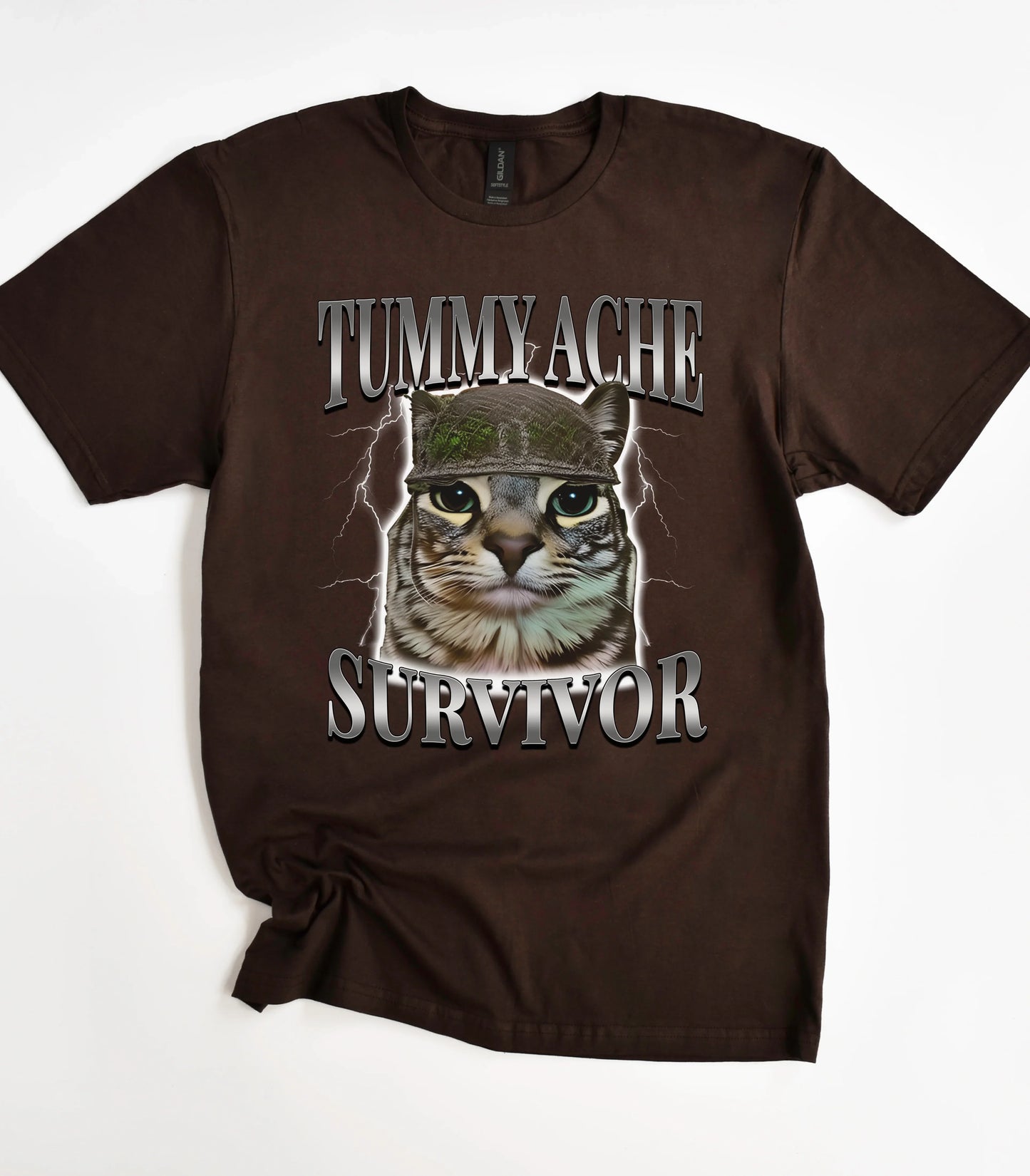 Tummy Ache Survivor cat graphic tee on brown shirt