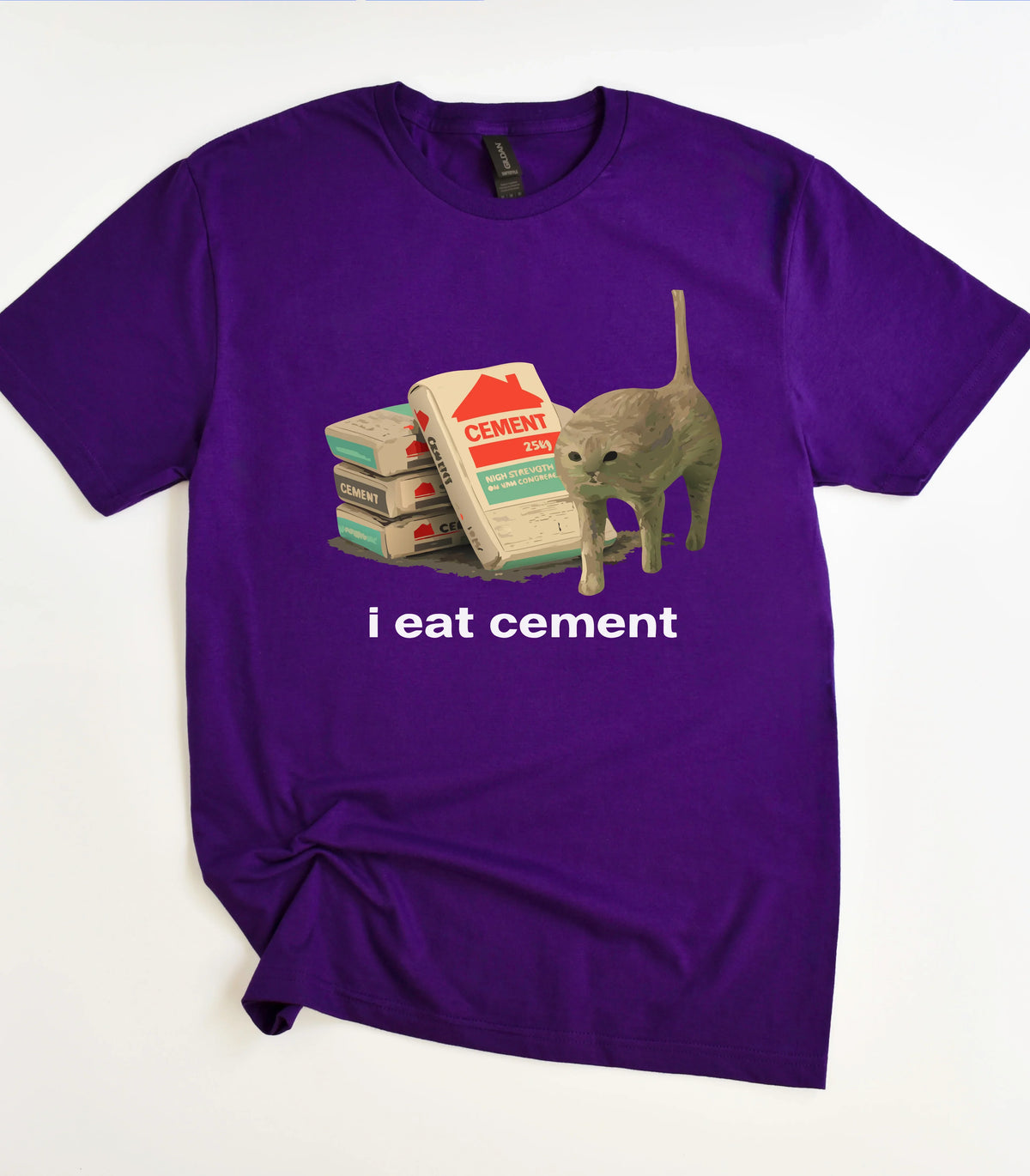 Funny cat graphic tee with 'i eat cement' text on purple shirt