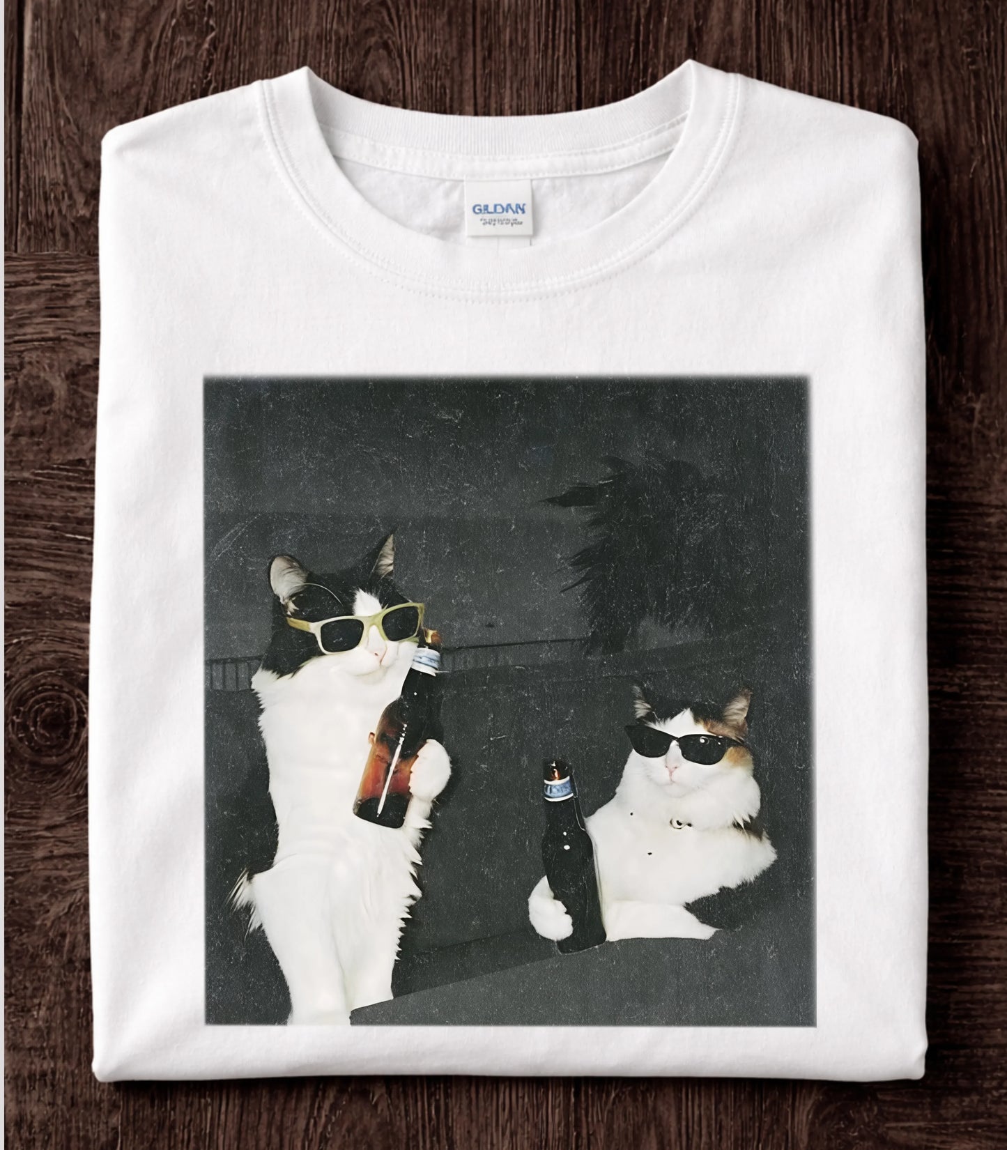 Funny cat graphic tee with two cats in sunglasses holding beer bottles