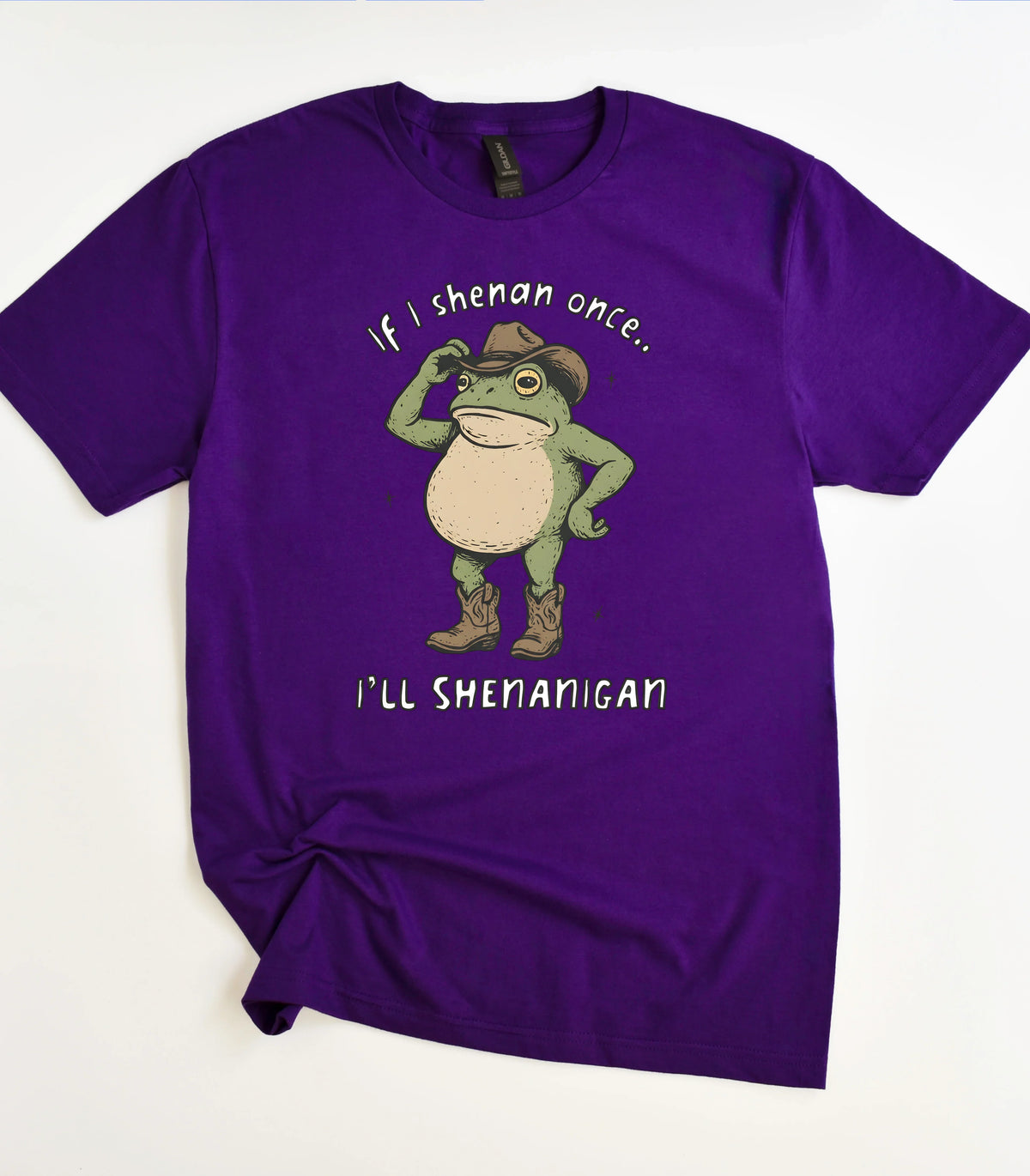 Funny frog graphic tee with cowboy hat and boots on purple shirt