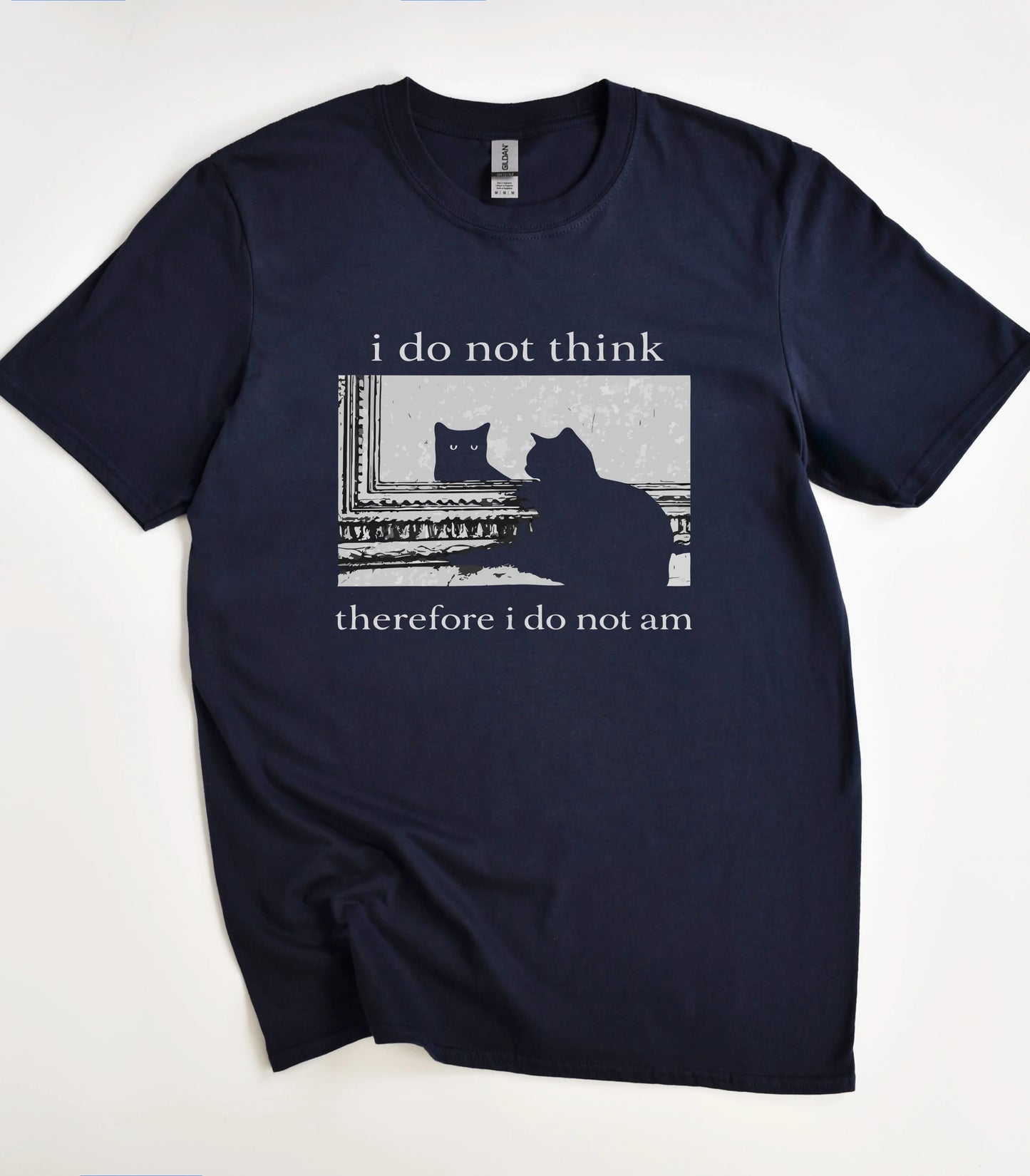 Funny cat graphic tee with 'i do not think therefore i do not am' text on navy shirt