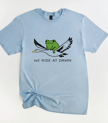 We Ride At Dawn Funny T-Shirt