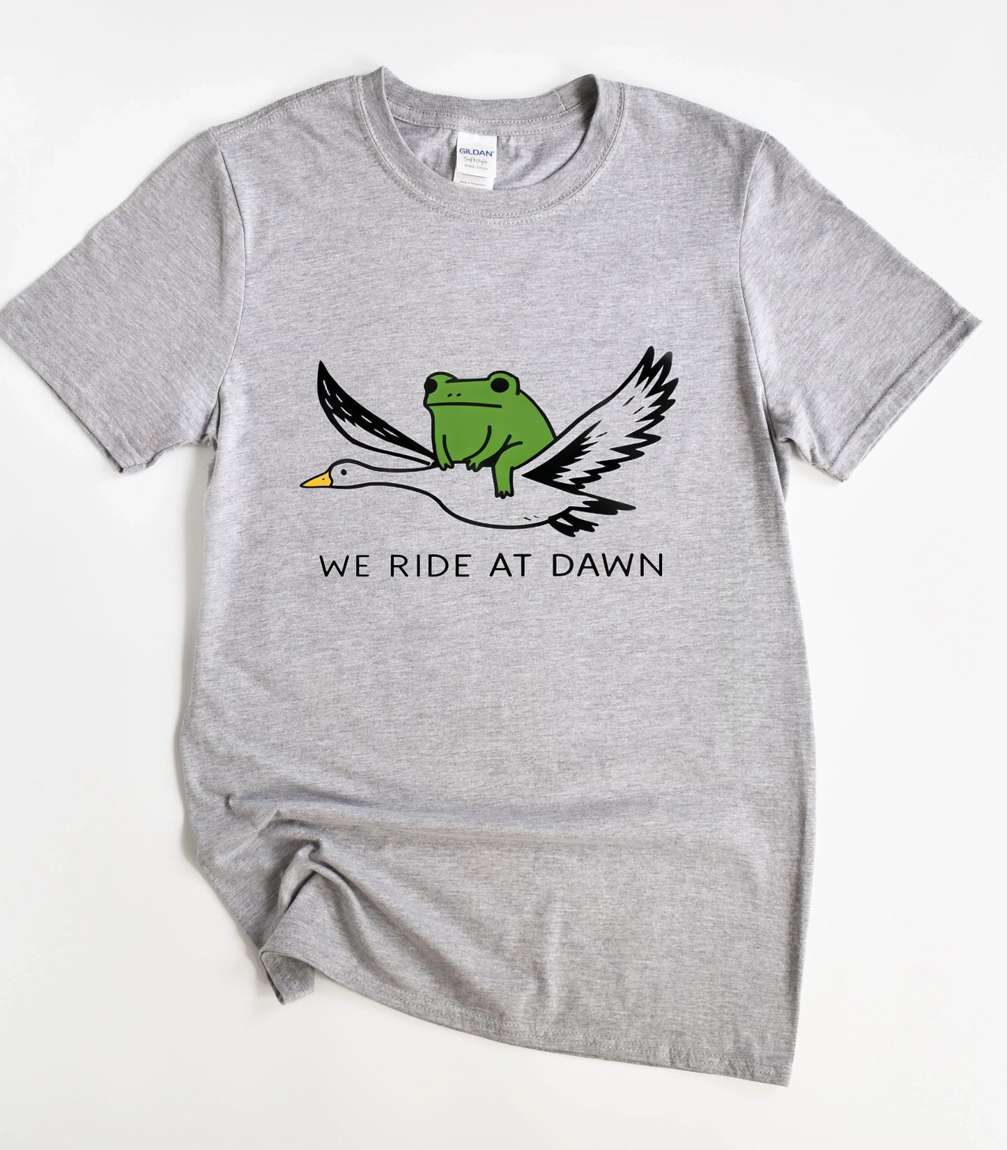We Ride At Dawn Funny T-Shirt